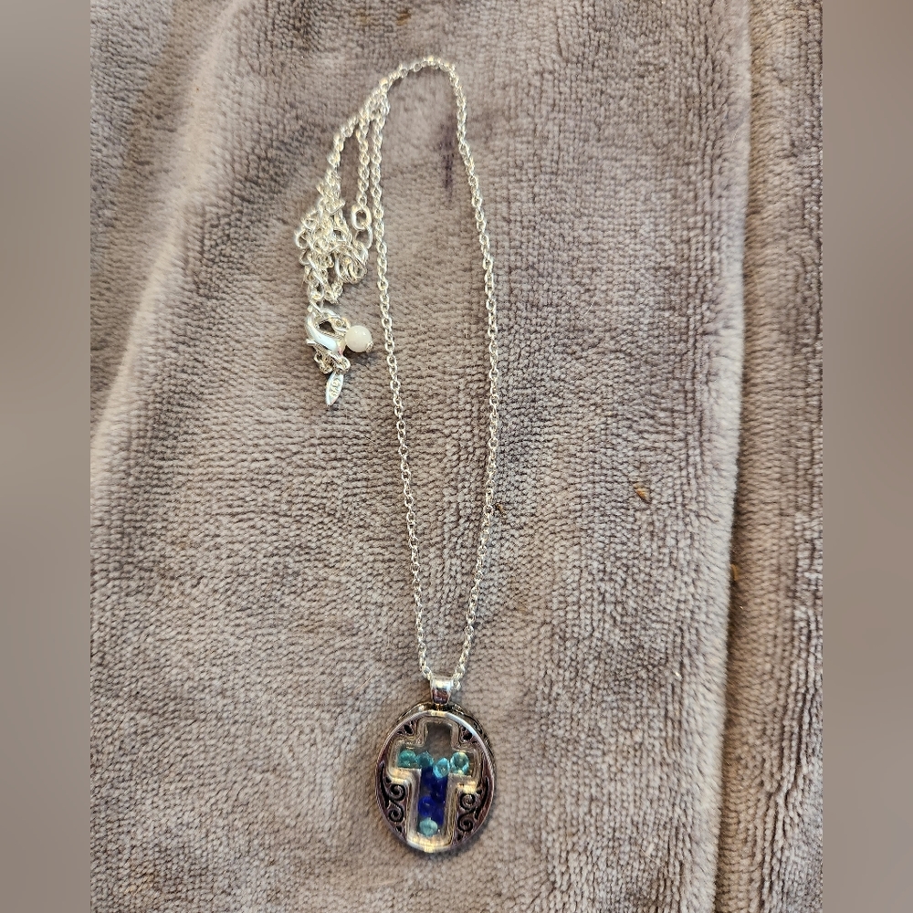 Cross necklace with little crystals inside
